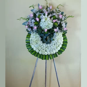 coronas para funerales rosadas